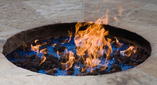 An image of a fire pit with fire glass.
