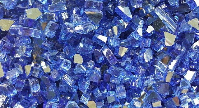 A close-up image of reflective fire glass beads.