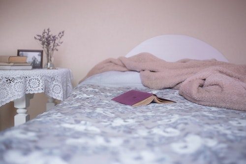 Weighted blanket on a bed